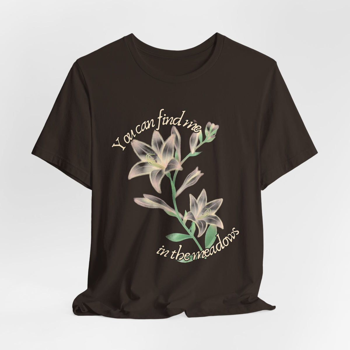 Floral Comfort Tee — "You can find me in the meadows..." Soft White Graphic T‑Shirt