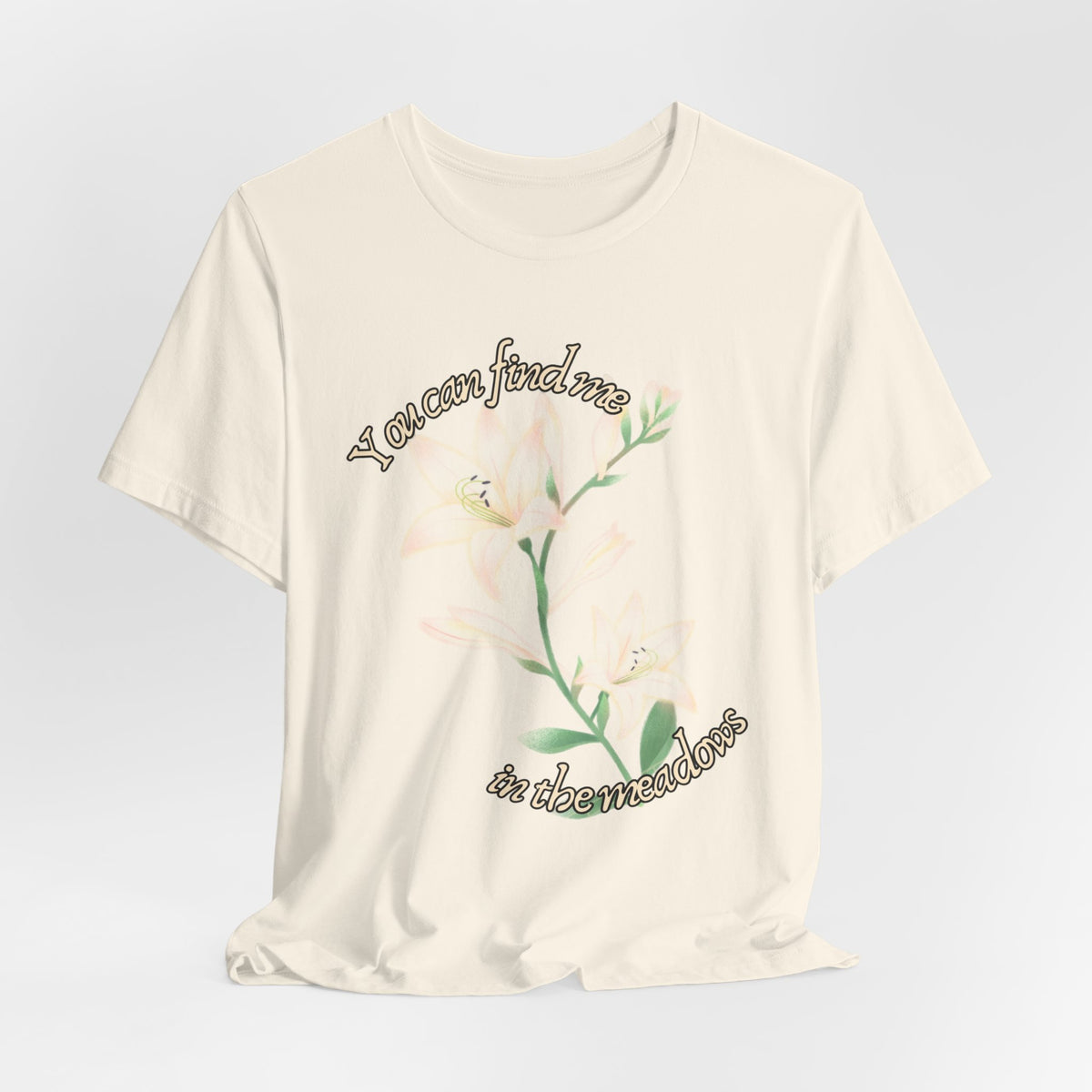 Floral Comfort Tee — "You can find me in the meadows..." Soft White Graphic T‑Shirt